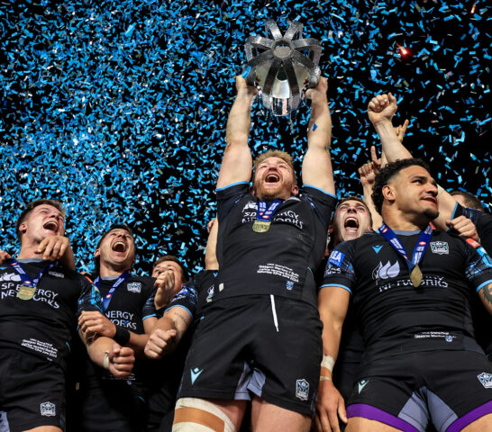 Kyle Steyn lifts the cup and celebrates with his side as URC champions 22/6/2024